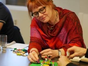 Photo of Åsa working with Lego